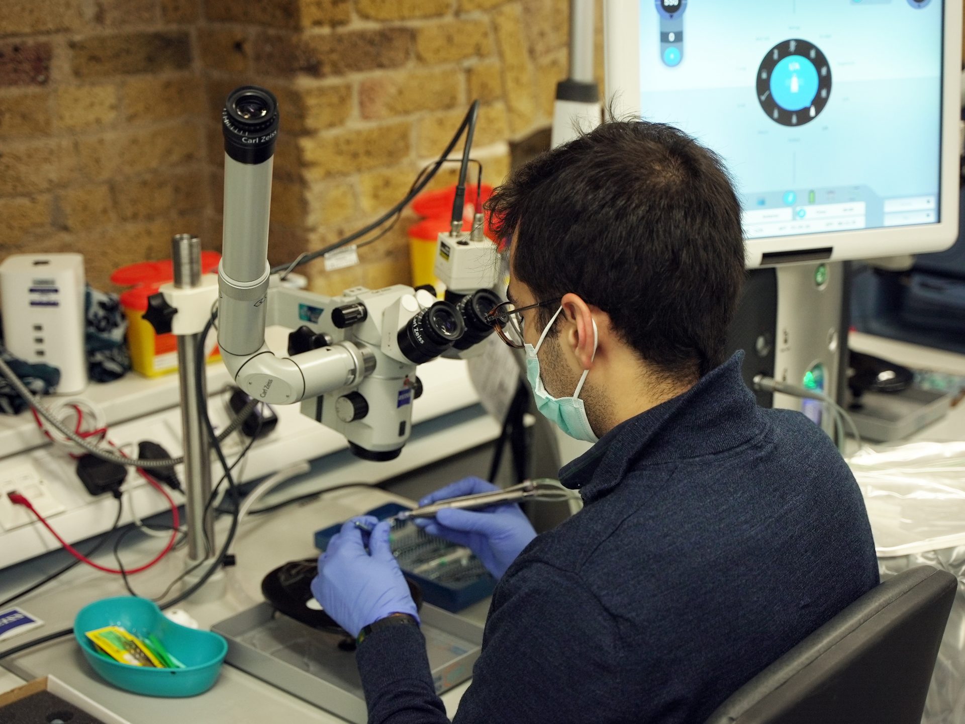 A man using a phaco machine