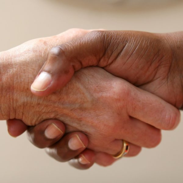 Two people shaking hands