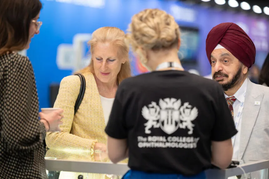 Delegates and staff members in conversation at Congress, the annual ophthalmology conference