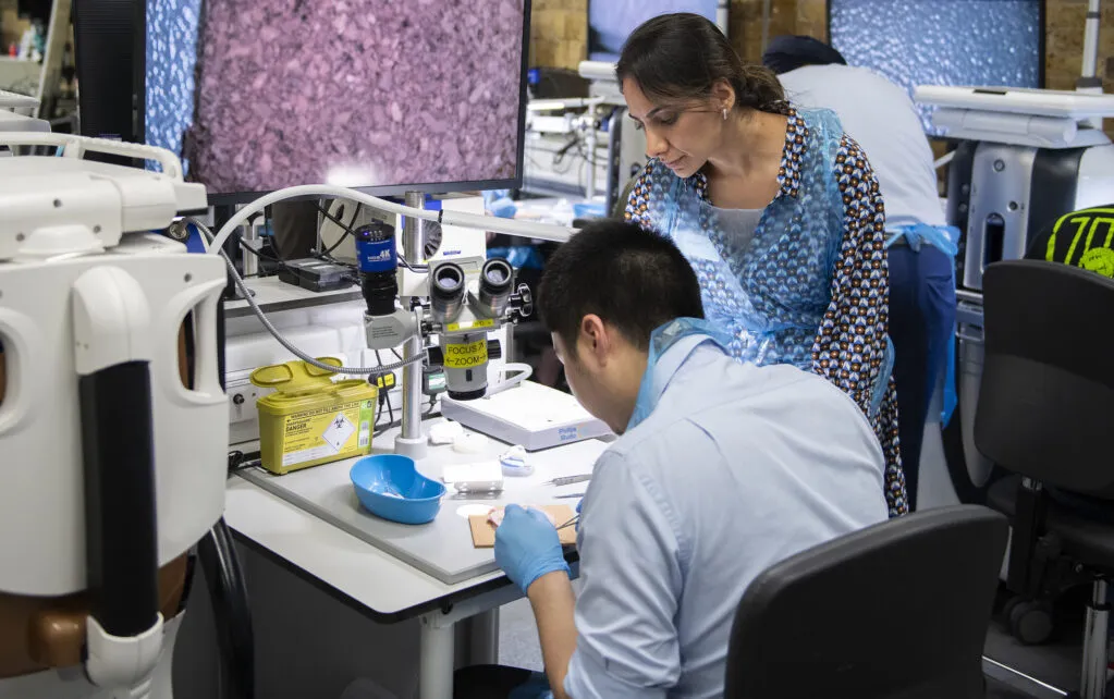Member ophthalmologists volunteering their time to train future ophthalmologists in the College skills centre